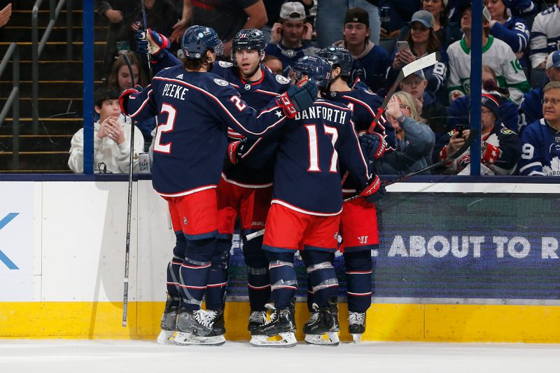 Dec 29, 2023; Columbus, Ohio, USA; Columbus Blue Jackets center Adam Fantilli (11) celebrates his goal against the Toronto Maple Leafs during the third period at Nationwide Arena. Mandatory Credit: Russell LaBounty-USA TODAY Sports