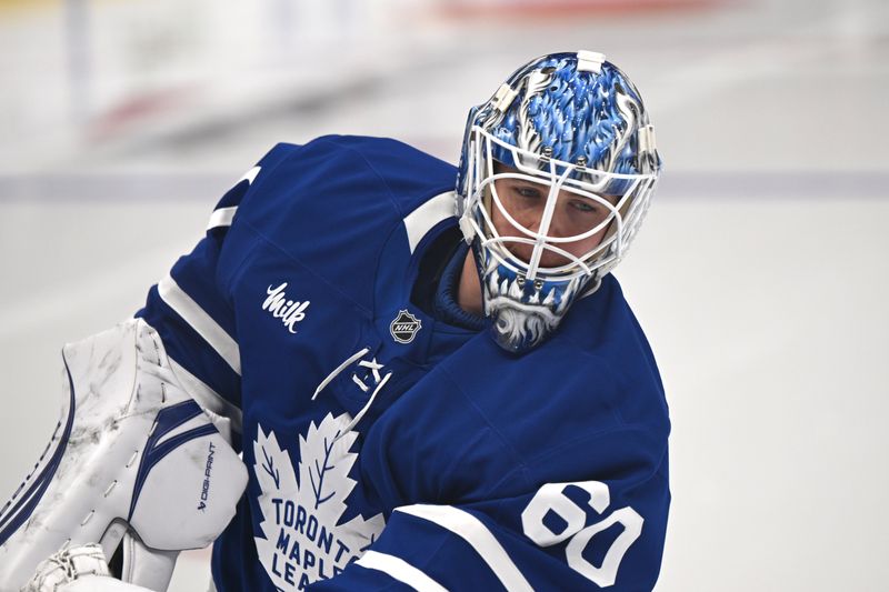 Jan 1, 2026; Toronto, Ontario, CAN;  Toronto Maple Leafs goalie Joseph Woll (60) warms up before playing the Winnipeg Jets at Scotiabank Arena. Mandatory Credit: Dan Hamilton-Imagn Images