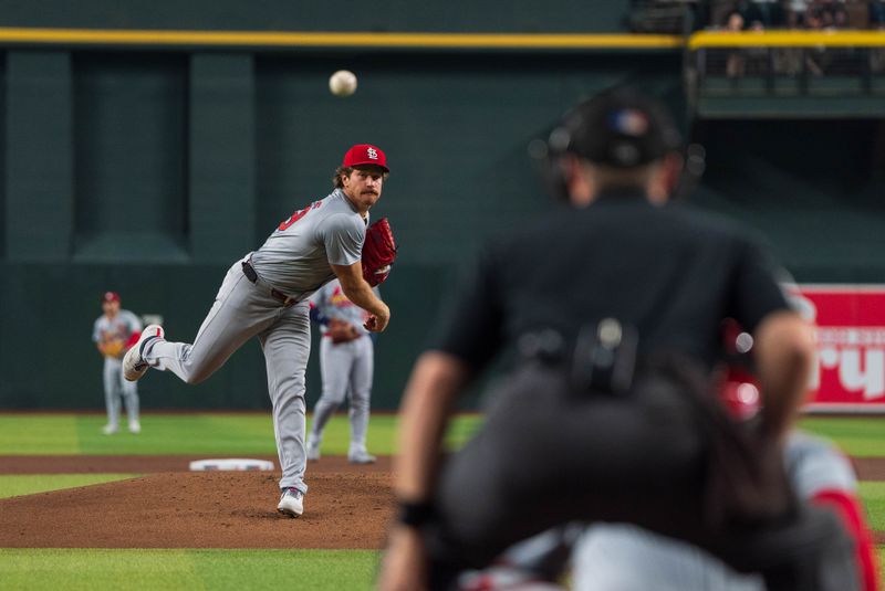 Apr 14, 2024; Phoenix, Arizona, USA; St. Louis Cardinals starting pitcher Miles Mikolas (39) throws in the first inning during a game against the Arizona Diamondbacks at Chase Field. Mandatory Credit: Allan Henry-USA TODAY Sports