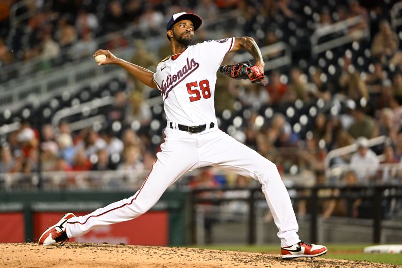 Apr 4, 2023; Washington, District of Columbia, USA; Washington Nationals relief pitcher Carl Edwards Jr. (58) throws to the Tampa Bay Rays during the seventh inning at Nationals Park. Mandatory Credit: Brad Mills-USA TODAY Sports