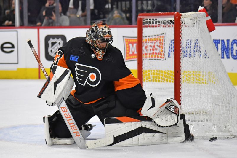 Mar 19, 2024; Philadelphia, Pennsylvania, USA; Philadelphia Flyers goaltender Samuel Ersson (33) makes a save against the Toronto Maple Leafs during the second period at Wells Fargo Center. Mandatory Credit: Eric Hartline-USA TODAY Sports