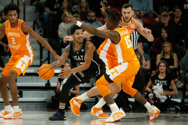 Jan 17, 2023; Starkville, Mississippi, USA; Mississippi State Bulldogs guard Shakeel Moore (3) looks for an open lane as Tennessee Volunteers guard Jahmai Mashack (15) defends during the first half at Humphrey Coliseum. Mandatory Credit: Petre Thomas-USA TODAY Sports