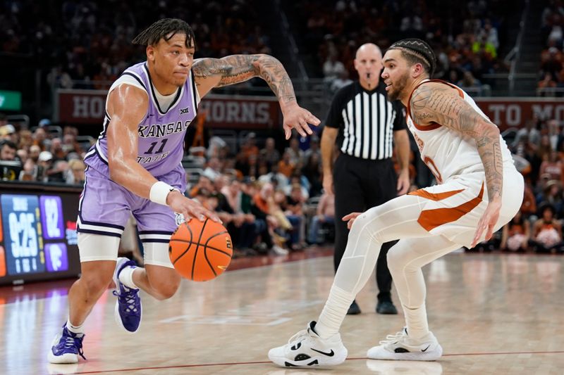 Jan 3, 2023; Austin, Texas, USA; Kansas State Wildcats forward Keyontae Johnson (11) drives to the basket against Texas Longhorns forward Timmy Allen (0) during the second half at Moody Center. Mandatory Credit: Scott Wachter-USA TODAY Sports