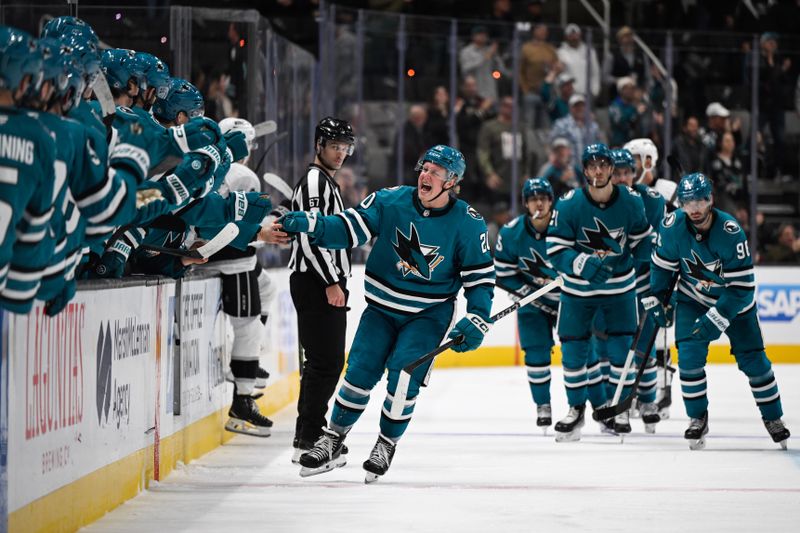 Oct 29, 2024; San Jose, California, USA; San Jose Sharks left wing Fabian Zetterlund (20) celebrates his goal against the Los Angeles Kings in the third period at SAP Center at San Jose. Mandatory Credit: Eakin Howard-Imagn Images