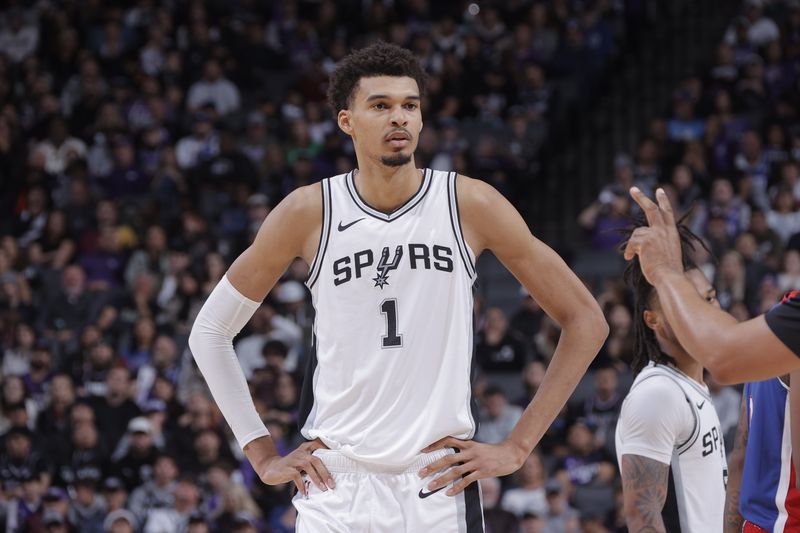 SACRAMENTO, CA - DECEMBER 1: Victor Wembanyama #1 of the San Antonio Spurs looks on during the game against the Sacramento Kings on December 1, 2024 at Golden 1 Center in Sacramento, California. NOTE TO USER: User expressly acknowledges and agrees that, by downloading and or using this Photograph, user is consenting to the terms and conditions of the Getty Images License Agreement. Mandatory Copyright Notice: Copyright 2024 NBAE (Photo by Rocky Widner/NBAE via Getty Images)