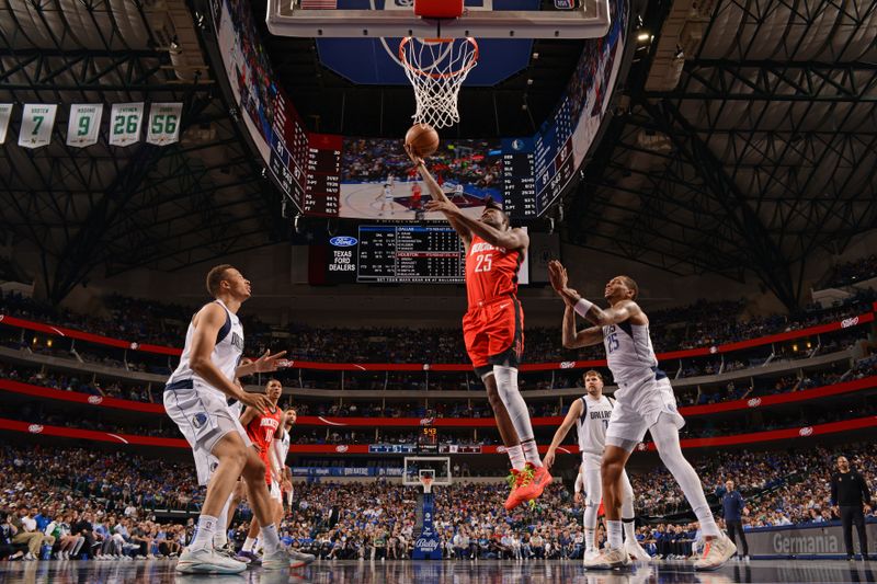 DALLAS, TX - APRIL 7: Reggie Bullock Jr. #25 of the Houston Rockets shoots the ball during the game against the Dallas Mavericks on April 7, 2024 at the American Airlines Center in Dallas, Texas. NOTE TO USER: User expressly acknowledges and agrees that, by downloading and or using this photograph, User is consenting to the terms and conditions of the Getty Images License Agreement. Mandatory Copyright Notice: Copyright 2024 NBAE (Photo by Glenn James/NBAE via Getty Images)