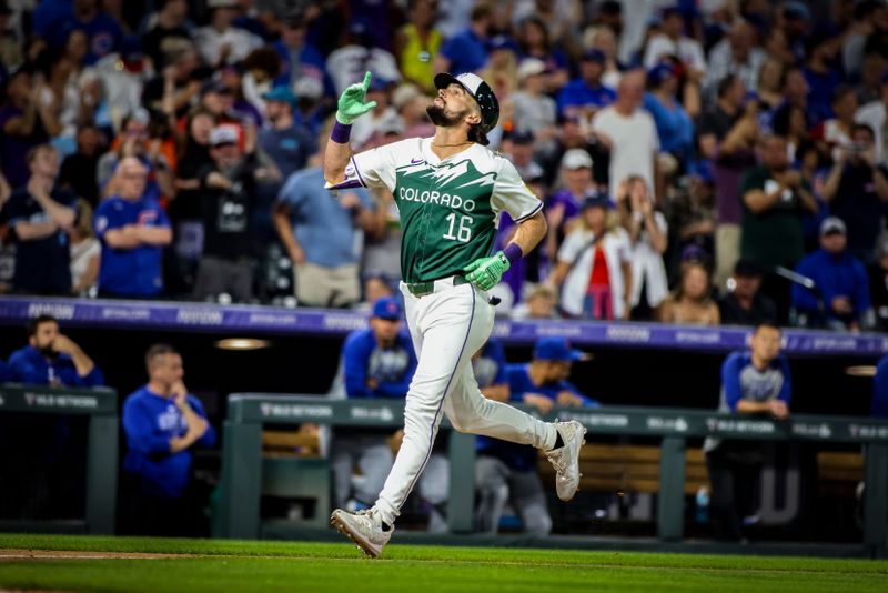 Sep 14, 2024; Denver, Colorado, USA; Colorado Rockies outfielder Sam Hilliard (16) celebrates as he runs to home against the Chicago Cubs at Coors Field. Mandatory Credit: Chet Strange-Imagn Images