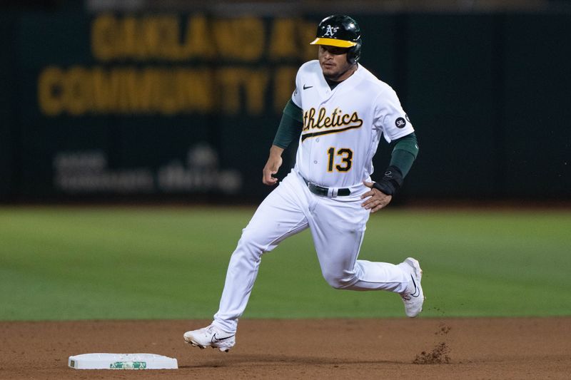 Sep 18, 2023; Oakland, California, USA;  Oakland Athletics second baseman Jordan Diaz (13) runs during the fourth inning against the Seattle Mariners at Oakland-Alameda County Coliseum. Mandatory Credit: Stan Szeto-USA TODAY Sports