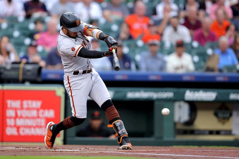 May 2, 2023; Houston, Texas, USA; San Francisco Giants shortstop Thairo Estrada (39) hits an infield single against the Houston Astros during the first inning at Minute Maid Park. Mandatory Credit: Erik Williams-USA TODAY Sports