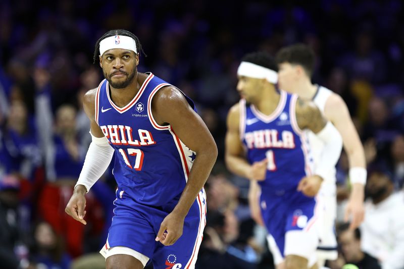 PHILADELPHIA, PENNSYLVANIA - MARCH 06: Buddy Hield #17 of the Philadelphia 76ers reacts after scoring during the first quarter against the Memphis Grizzlies at the Wells Fargo Center on March 06, 2024 in Philadelphia, Pennsylvania. NOTE TO USER: User expressly acknowledges and agrees that, by downloading and or using this photograph, User is consenting to the terms and conditions of the Getty Images License Agreement.  (Photo by Tim Nwachukwu/Getty Images)