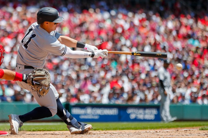 May 21, 2023; Cincinnati, Ohio, USA; New York Yankees shortstop Anthony Volpe (11) hits an RBI double in the seventh inning against the Cincinnati Reds at Great American Ball Park. Mandatory Credit: Katie Stratman-USA TODAY Sports