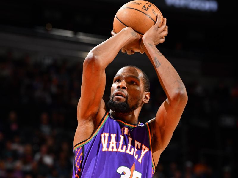 PHOENIX, AZ - MARCH 2: Kevin Durant #35 of the Phoenix Suns shoots a free throw during the game against the Minnesota Timberwolves  on March 2, 2025 at PHX Arena in Phoenix, Arizona. NOTE TO USER: User expressly acknowledges and agrees that, by downloading and or using this photograph, user is consenting to the terms and conditions of the Getty Images License Agreement. Mandatory Copyright Notice: Copyright 2025 NBAE (Photo by Barry Gossage/NBAE via Getty Images)