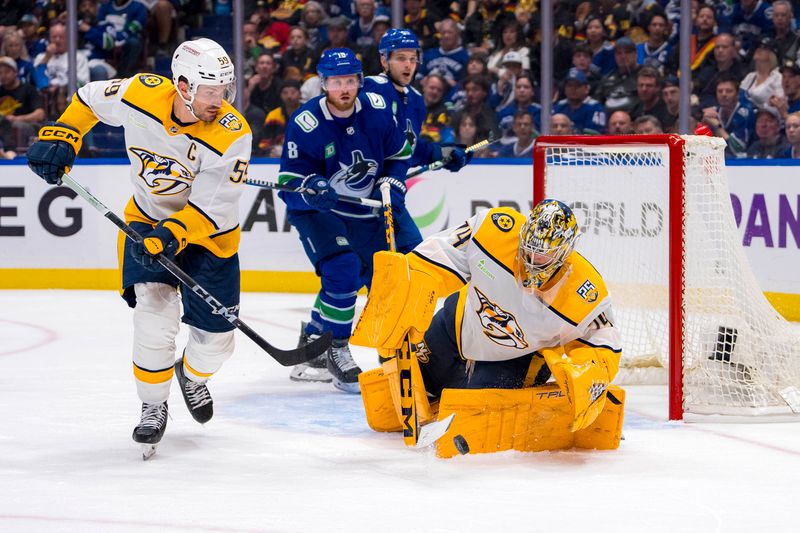 Apr 23, 2024; Vancouver, British Columbia, CAN; Nashville Predators defenseman Roman Josi (59) watches as goalie Juuse Saros (74) gathers the rebound against the Vancouver Canucks during the third period in game two of the first round of the 2024 Stanley Cup Playoffs at Rogers Arena. Mandatory Credit: Bob Frid-USA TODAY Sports