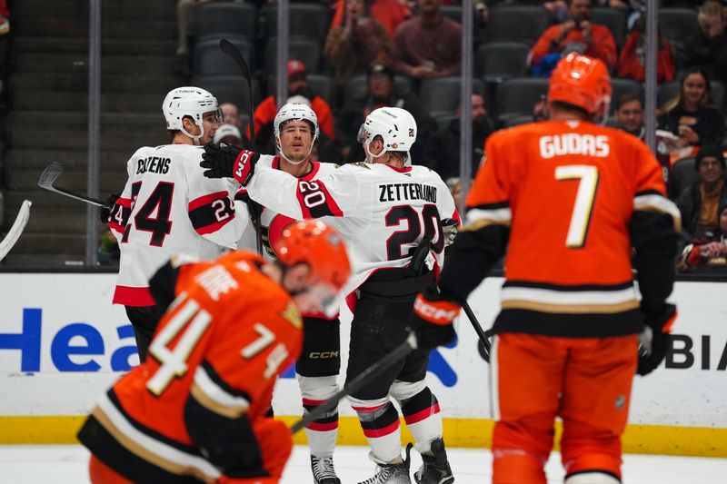 Nov 20, 2025; Anaheim, California, USA; Ottawa Senators center Dylan Cozens (24), defenseman Nick Jensen (3) and left wing Fabian Zetterlund (20) celebrate after a goal Anaheim Ducks in the first period at Honda Center. Mandatory Credit: Kirby Lee-Imagn Images
