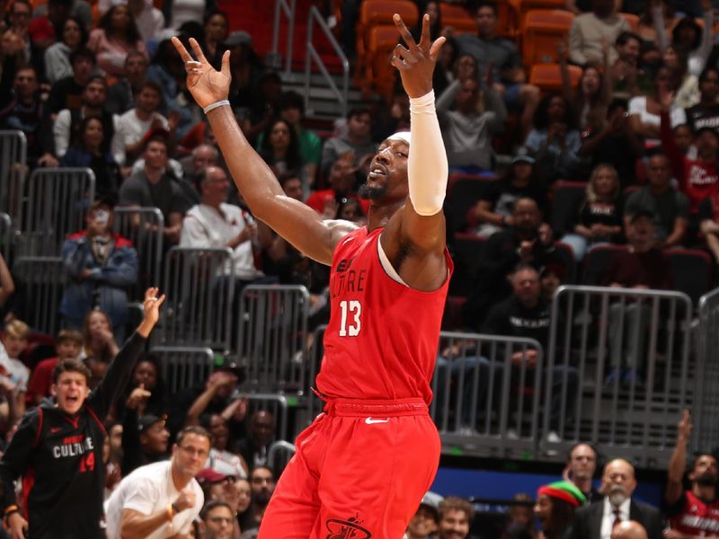 MIAMI, FL - DECEMBER 8: Bam Adebayo #13 of the Miami Heat celebrates during the game against the Cleveland Cavaliers on December 8, 2024 at Kaseya Center in Miami, Florida. NOTE TO USER: User expressly acknowledges and agrees that, by downloading and or using this Photograph, user is consenting to the terms and conditions of the Getty Images License Agreement. Mandatory Copyright Notice: Copyright 2024 NBAE (Photo by Issac Baldizon/NBAE via Getty Images)