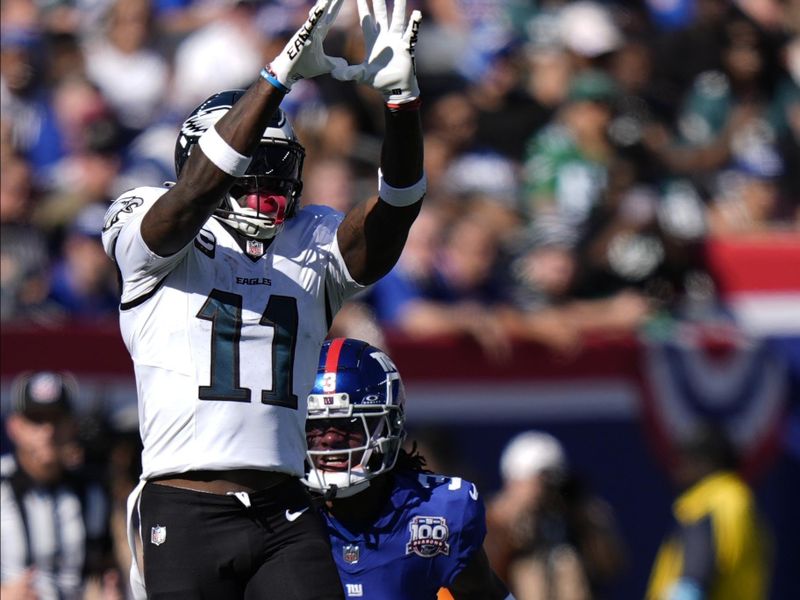 Philadelphia Eagles wide receiver A.J. Brown (11) makes a catch against the New York Giants during the first quarter of an NFL football game, Sunday, Oct. 20, 2024, in East Rutherford, N.J. (AP Photo/Frank Franklin II)