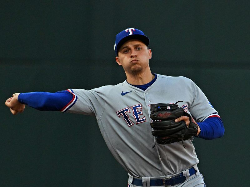 Oct 8, 2023; Baltimore, Maryland, USA; Texas Rangers shortstop Corey Seager (5) throws to first base for an out during the second inning during game two of the ALDS for the 2023 MLB playoffs at Oriole Park at Camden Yards. Mandatory Credit: Tommy Gilligan-USA TODAY Sports