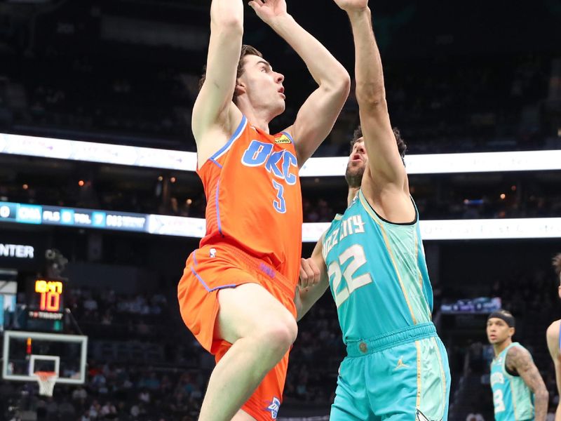 CHARLOTTE, NC - APRIL 7: Josh Giddey #3 of the Oklahoma City Thunder drives to the basket during the game against the Charlotte Hornets on April 7, 2024 at Spectrum Center in Charlotte, North Carolina. NOTE TO USER: User expressly acknowledges and agrees that, by downloading and or using this photograph, User is consenting to the terms and conditions of the Getty Images License Agreement.  Mandatory Copyright Notice:  Copyright 2024 NBAE (Photo by Brock Williams-Smith/NBAE via Getty Images)