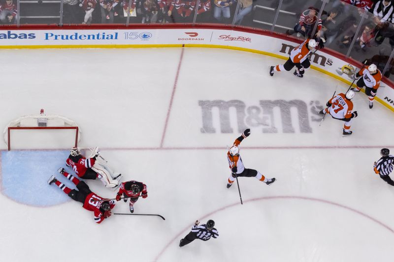 Jan 18, 2025; Newark, New Jersey, USA; Philadelphia Flyers right wing Bobby Brink (10) celebrates his goal against the New Jersey Devils during the third period at Prudential Center. Mandatory Credit: Ed Mulholland-Imagn Images