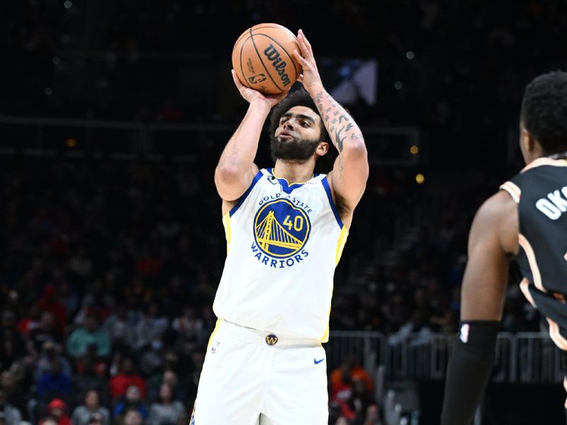 ATLANTA, GA - MARCH 17: Anthony Lamb #40 of the Golden State Warriors shoots the ball during the game against the Atlanta Hawks on March 17, 2023 at State Farm Arena in Atlanta, Georgia.  NOTE TO USER: User expressly acknowledges and agrees that, by downloading and/or using this Photograph, user is consenting to the terms and conditions of the Getty Images License Agreement. Mandatory Copyright Notice: Copyright 2023 NBAE (Photo by Adam Hagy/NBAE via Getty Images)