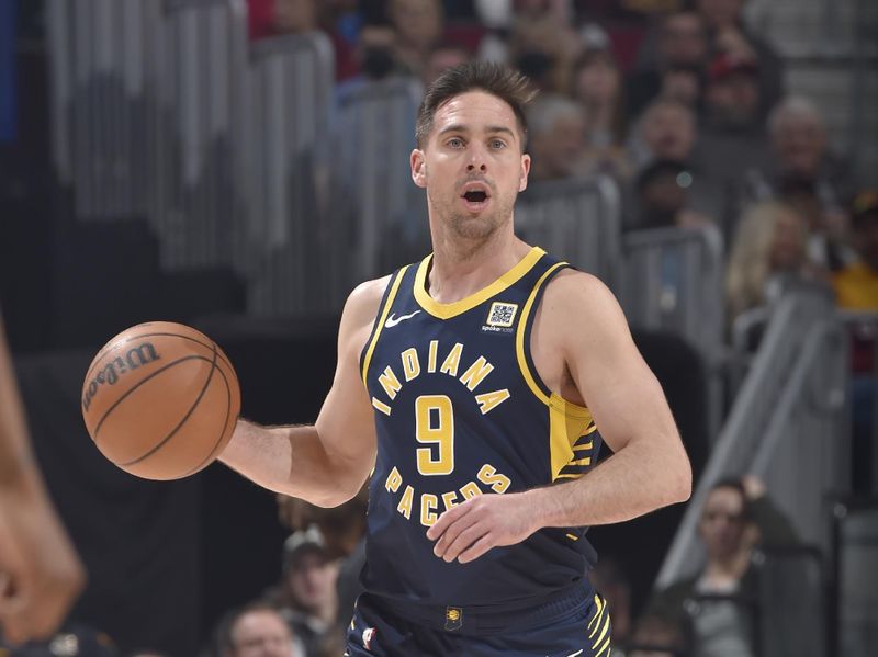 CLEVELAND, OH - APRIL 13:  T.J. McConnell #9 of the Indiana Pacers dribbles the ball during the game against the Cleveland Cavaliers on April 13, 2025 at Rocket Arena in Cleveland, Ohio. NOTE TO USER: User expressly acknowledges and agrees that, by downloading and/or using this Photograph, user is consenting to the terms and conditions of the Getty Images License Agreement. Mandatory Copyright Notice: Copyright 2025 NBAE (Photo by David Liam Kyle/NBAE via Getty Images)