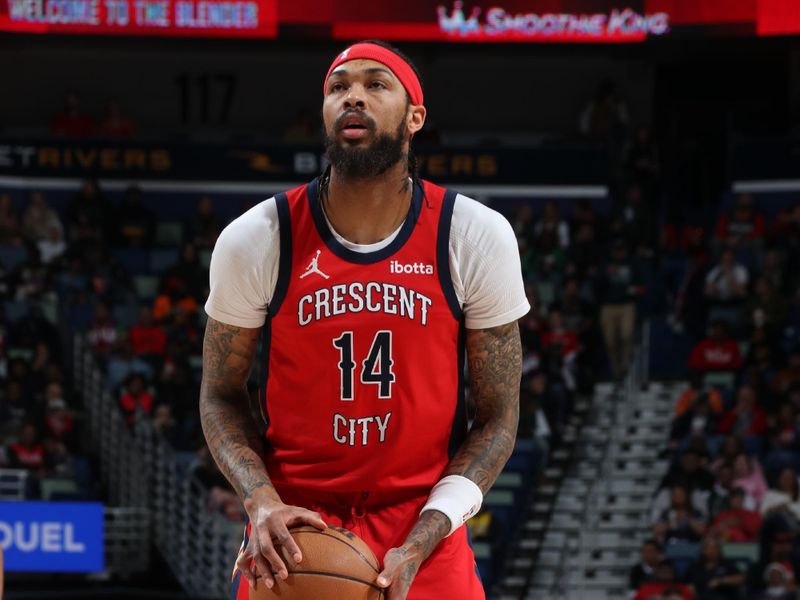 NEW ORLEANS, LA - FEBRUARY 14: Brandon Ingram #14 of the New Orleans Pelicans shoots a free throw during the game against the Washington Wizards on February 14, 2024 at the Smoothie King Center in New Orleans, Louisiana. NOTE TO USER: User expressly acknowledges and agrees that, by downloading and or using this Photograph, user is consenting to the terms and conditions of the Getty Images License Agreement. Mandatory Copyright Notice: Copyright 2024 NBAE (Photo by Layne Murdoch Jr./NBAE via Getty Images)