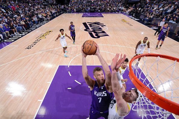 SACRAMENTO, CA - DECEMBER 16: Sasha Vezenkov #7 of the Sacramento Kings drives to the basket during the game against the Utah Jazz on December 16, 2023 at Golden 1 Center in Sacramento, California. NOTE TO USER: User expressly acknowledges and agrees that, by downloading and or using this Photograph, user is consenting to the terms and conditions of the Getty Images License Agreement. Mandatory Copyright Notice: Copyright 2023 NBAE (Photo by Rocky Widner/NBAE via Getty Images)