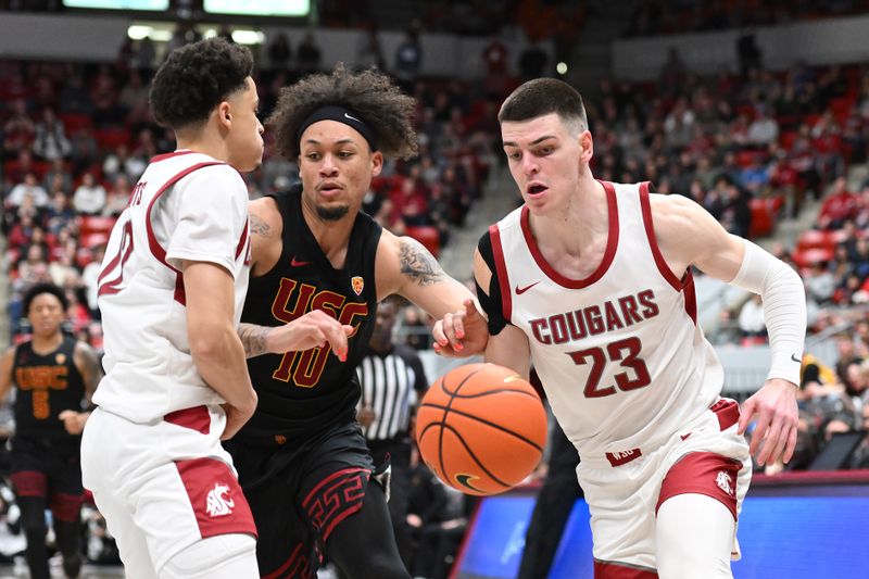 Feb 29, 2024; Pullman, Washington, USA; Washington State Cougars forward Andrej Jakimovski (23) gets by USC Trojans forward DJ Rodman (10) in the second half at Friel Court at Beasley Coliseum. Washington State Cougars won 75-72. Mandatory Credit: James Snook-USA TODAY Sports