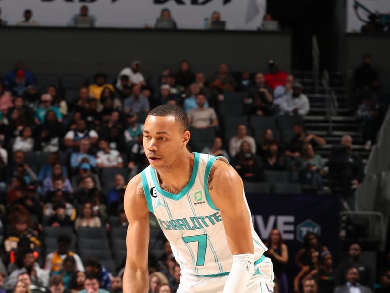 CHARLOTTE, NC - JANUARY 4: Bryce McGowans #7 of the Charlotte Hornets dribbles the ball during the game against the Memphis Grizzlies on January 4, 2023 at Spectrum Center in Charlotte, North Carolina. NOTE TO USER: User expressly acknowledges and agrees that, by downloading and or using this photograph, User is consenting to the terms and conditions of the Getty Images License Agreement. Mandatory Copyright Notice: Copyright 2023 NBAE (Photo by Kent Smith/NBAE via Getty Images)