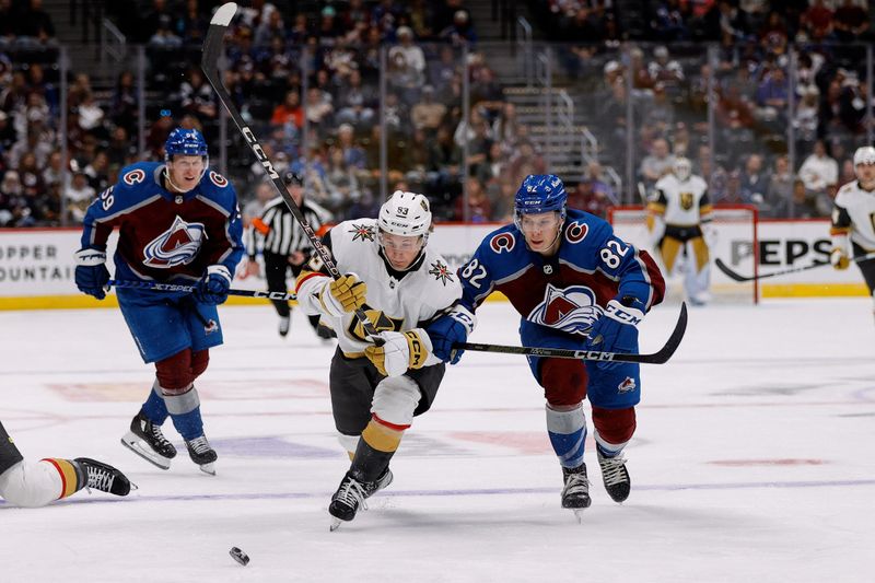 Sep 25, 2023; Denver, Colorado, USA; Vegas Golden Knights right wing Ben Hemmerling (63) and Colorado Avalanche center Ivan Ivan (82) battle for the puck in the third period at Ball Arena. Mandatory Credit: Isaiah J. Downing-USA TODAY Sports