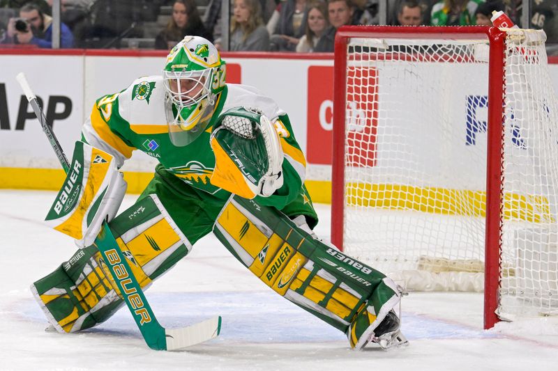 Feb 17, 2024; Saint Paul, Minnesota, USA;  Minnesota Wild goalie Filip Gustavsson (32) follows the play against the Buffalo Sabres during the first period at Xcel Energy Center. Mandatory Credit: Nick Wosika-USA TODAY Sports