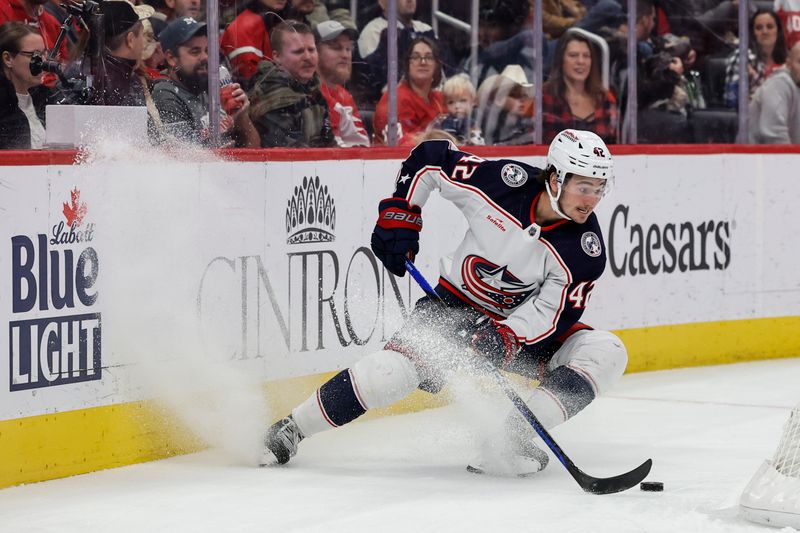 Nov 11, 2023; Detroit, Michigan, USA;  Columbus Blue Jackets center Alexandre Texier (42) skates with the puck against the Detroit Red Wings in the third period at Little Caesars Arena. Mandatory Credit: Rick Osentoski-USA TODAY Sports