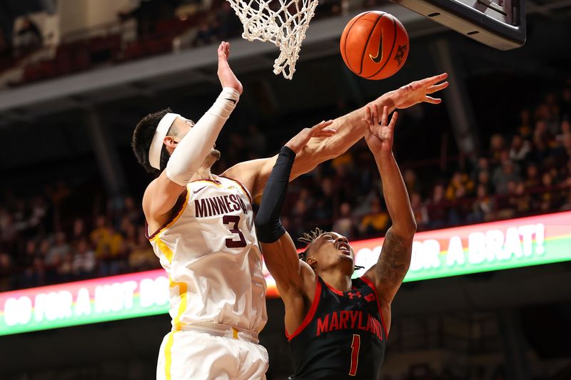 Jan 7, 2024; Minneapolis, Minnesota, USA; Minnesota Golden Gophers forward Dawson Garcia (3) blocks a shot by Maryland Terrapins guard Jahmir Young (1) during the second half at Williams Arena. Mandatory Credit: Matt Krohn-USA TODAY Sports