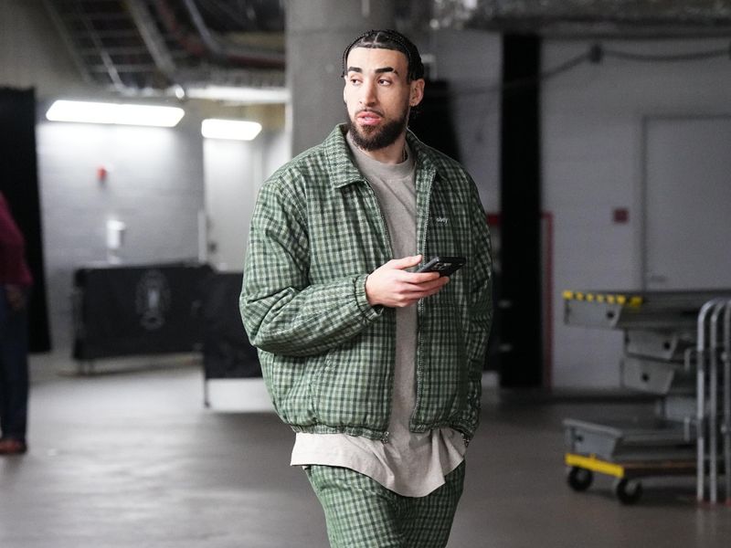 DALLAS, TX - JANUARY 27: Chris Duarte #3 of the Sacramento Kings arrives to the arena before the game on January 27, 2024 at the American Airlines Center in Dallas, Texas. NOTE TO USER: User expressly acknowledges and agrees that, by downloading and or using this photograph, User is consenting to the terms and conditions of the Getty Images License Agreement. Mandatory Copyright Notice: Copyright 2024 NBAE (Photo by Glenn James/NBAE via Getty Images)