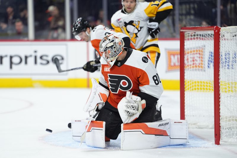Dec 1, 2025; Philadelphia, Pennsylvania, USA; Philadelphia Flyers goalie Dan Vladar (80) makes a save against the Pittsburgh Penguins in the second period at Xfinity Mobile Arena. Mandatory Credit: Kyle Ross-Imagn Images