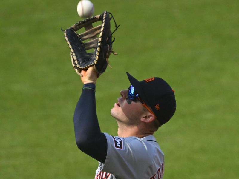 Oct 12, 2024; Cleveland, Ohio, USA; Detroit Tigers first base Spencer Torkelson (20) makes a catch in the third inning against the Cleveland Guardians during game five of the ALDS for the 2024 MLB Playoffs at Progressive Field. Mandatory Credit: David Richard-Imagn Images