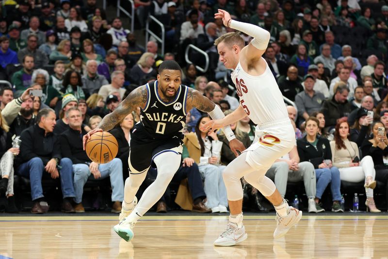 MILWAUKEE, WISCONSIN - JANUARY 26: Damian Lillard #0 of the Milwaukee Bucks is defended by Sam Merrill #5 of the Cleveland Cavaliers \da at Fiserv Forum on January 26, 2024 in Milwaukee, Wisconsin. NOTE TO USER: User expressly acknowledges and agrees that, by downloading and or using this photograph, User is consenting to the terms and conditions of the Getty Images License Agreement. (Photo by Stacy Revere/Getty Images)