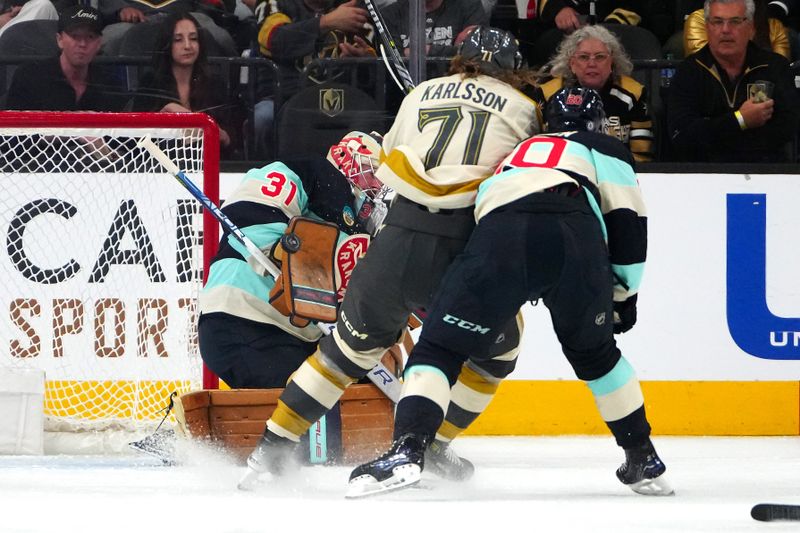 Mar 21, 2024; Las Vegas, Nevada, USA; Seattle Kraken goaltender Philipp Grubauer (31) makes a save against Vegas Golden Knights center William Karlsson (71) during the third period at T-Mobile Arena. Mandatory Credit: Stephen R. Sylvanie-USA TODAY Sports