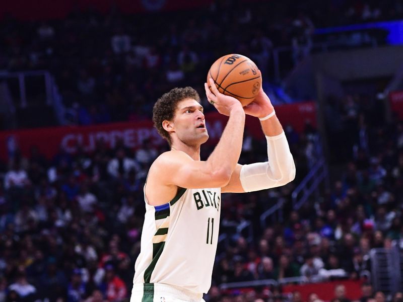 LOS ANGELES, CA - FEBRUARY 10: Brook Lopez #11 of the Milwaukee Bucks shoots the ball during the game against the LA Clippers on February 10, 2023 at Crypto.Com Arena in Los Angeles, California. NOTE TO USER: User expressly acknowledges and agrees that, by downloading and/or using this Photograph, user is consenting to the terms and conditions of the Getty Images License Agreement. Mandatory Copyright Notice: Copyright 2023 NBAE (Photo by Adam Pantozzi/NBAE via Getty Images)