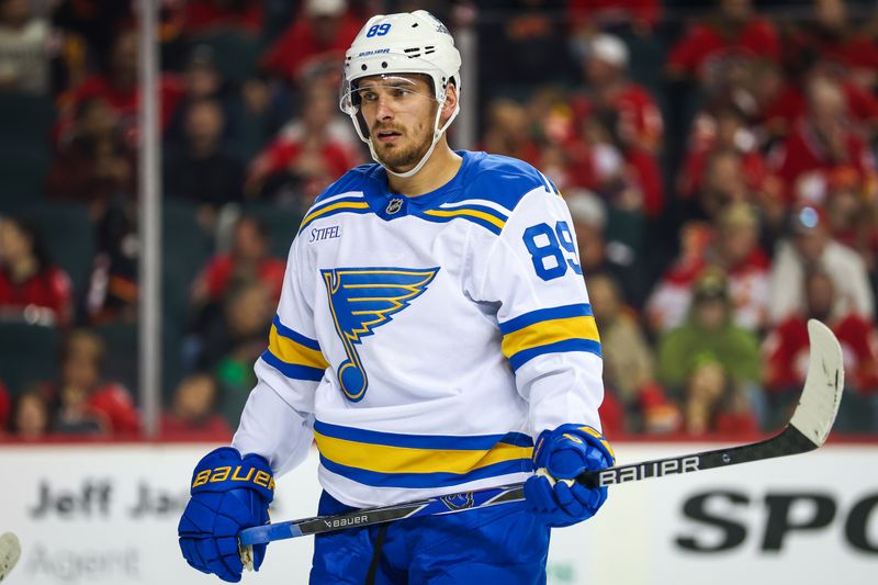 Oct 11, 2025; Calgary, Alberta, CAN; St. Louis Blues left wing Pavel Buchnevich (89) against the Calgary Flames during the first period at Scotiabank Saddledome. Mandatory Credit: Sergei Belski-Imagn Images