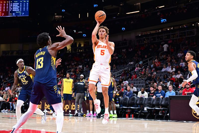 ATLANTA, GA - OCTOBER 8: Dyson Daniels #5 of the Atlanta Hawks drives to the basket during the game against the Indiana Pacers during a NBA preseason game on October 8, 2024 at State Farm Arena in Atlanta, Georgia.  NOTE TO USER: User expressly acknowledges and agrees that, by downloading and/or using this Photograph, user is consenting to the terms and conditions of the Getty Images License Agreement. Mandatory Copyright Notice: Copyright 2024 NBAE (Photo by Adam Hagy/NBAE via Getty Images)