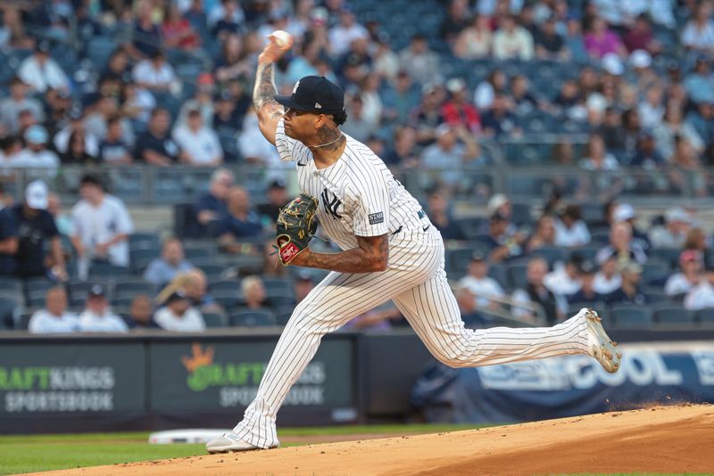 Aug 20, 2024; Bronx, New York, USA; New York Yankees starting pitcher Luis Gil (81) delivers a pitch during the first inning against the Cleveland Guardians at Yankee Stadium. Mandatory Credit: Vincent Carchietta-USA TODAY Sports