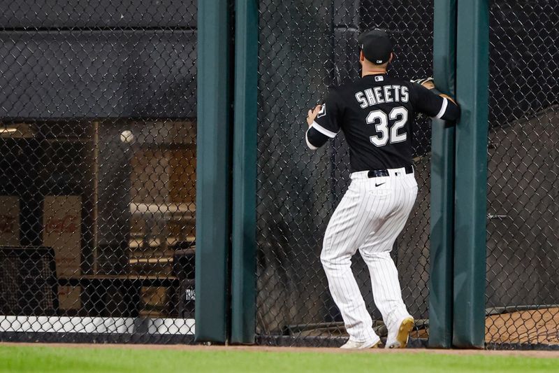 Sep 14, 2023; Chicago, Illinois, USA; Chicago White Sox right fielder Gavin Sheets (32) is unable to catch a Minnesota Twins second baseman Edouard Julien solo home run during the fourth inning at Guaranteed Rate Field. Mandatory Credit: Kamil Krzaczynski-USA TODAY Sports