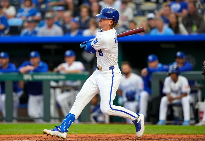 May 28, 2025; Kansas City, Missouri, USA; Kansas City Royals center fielder Drew Waters (8) hits an RBI single during the fourth inning against the Cincinnati Reds at Kauffman Stadium. Mandatory Credit: Jay Biggerstaff-Imagn Images