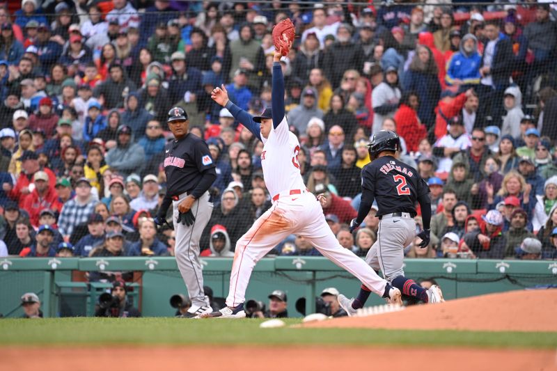 Apr 18, 2024; Boston, Massachusetts, USA; Cleveland Guardians center fielder Tyler Freeman (2) is safe at first base covered by Boston Red Sox first baseman Triston Casas (36) during the fourth inning at Fenway Park. Mandatory Credit: Eric Canha-USA TODAY Sports