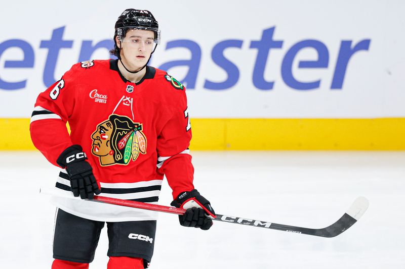 Dec 13, 2025; Chicago, Illinois, USA; Chicago Blackhawks left wing Nick Lardis (76) warms up before an NHL game against the Detroit Red Wings at United Center. Mandatory Credit: Kamil Krzaczynski-Imagn Images