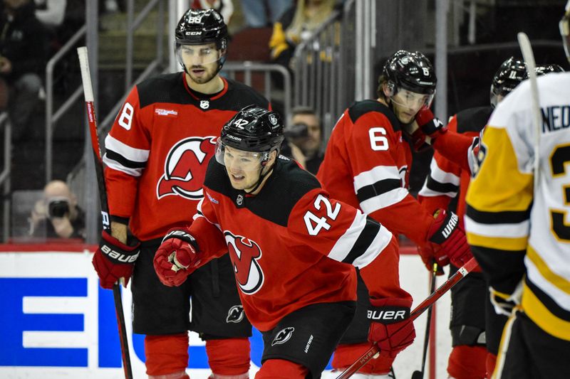 Apr 2, 2024; Newark, New Jersey, USA; New Jersey Devils center Curtis Lazar (42) reacts after scoring a goal against the Pittsburgh Penguins during the second period at Prudential Center. Mandatory Credit: John Jones-USA TODAY Sports