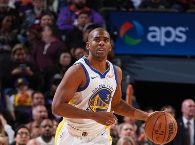 PHOENIX, AZ - DECEMBER 12: Chris Paul #3 of the Golden State Warriors dribbles the ball during the game against the Phoenix Suns on December 12, 2023 at Footprint Center in Phoenix, Arizona. NOTE TO USER: User expressly acknowledges and agrees that, by downloading and or using this photograph, user is consenting to the terms and conditions of the Getty Images License Agreement. Mandatory Copyright Notice: Copyright 2023 NBAE (Photo by Garrett Ellwood/NBAE via Getty Images)