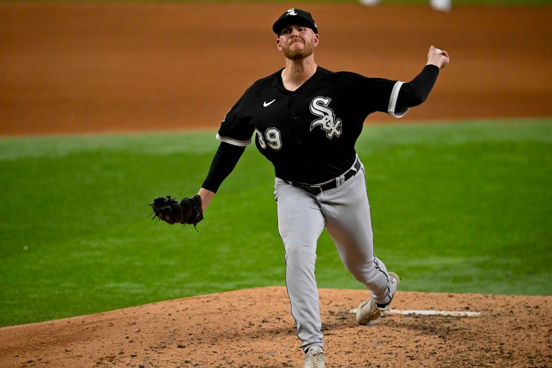 Aug 3, 2023; Arlington, Texas, USA; Chicago White Sox relief pitcher Aaron Bummer (39) pitches against the Texas Rangers during the seventh inning at Globe Life Field. Mandatory Credit: Jerome Miron-USA TODAY Sports