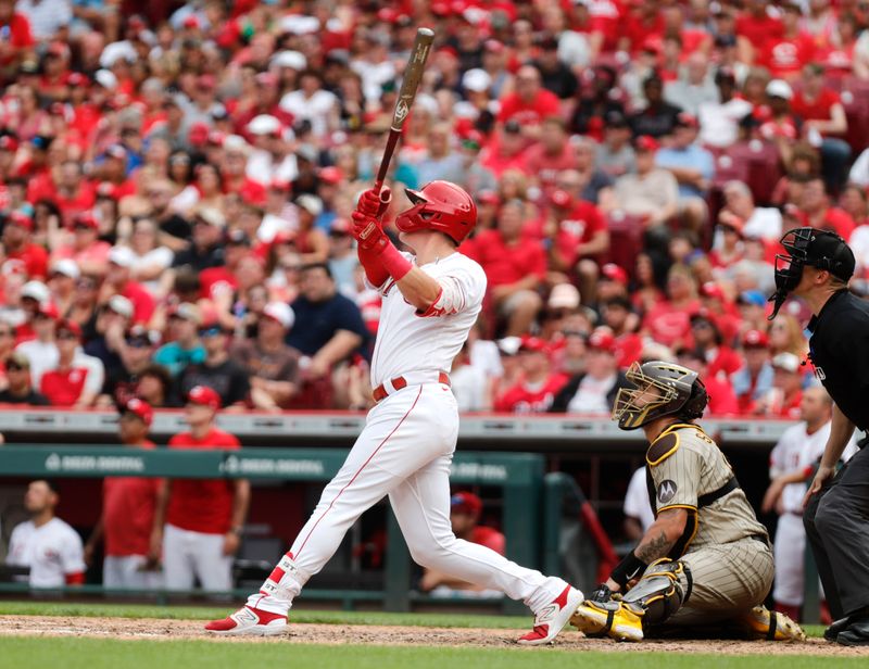 Jul 2, 2023; Cincinnati, Ohio, USA; Cincinnati Reds pinch hitter Tyler Stephenson (37) hits a two-run home run against the San Diego Padres during the eighth inning at Great American Ball Park. Mandatory Credit: David Kohl-USA TODAY Sports